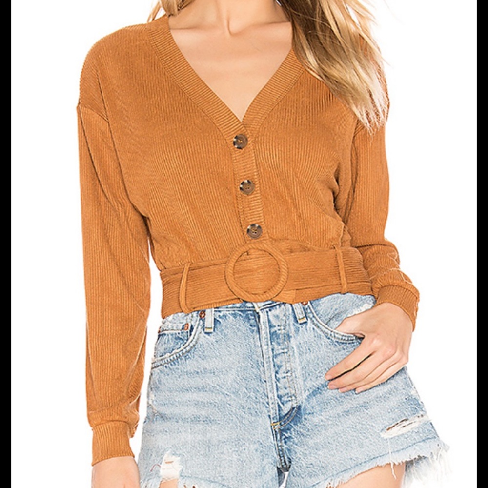 Revolve Button Front Top